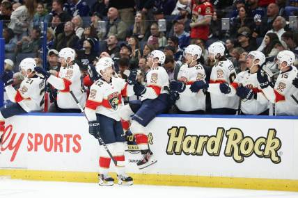 Feb 17, 2024; Tampa, Florida, USA;  Florida Panthers defenseman Gustav Forsling (42) celebrates after scoring a goal against the Tampa Bay Lightning in the first period at Amalie Arena. Mandatory Credit: Nathan Ray Seebeck-USA TODAY Sports