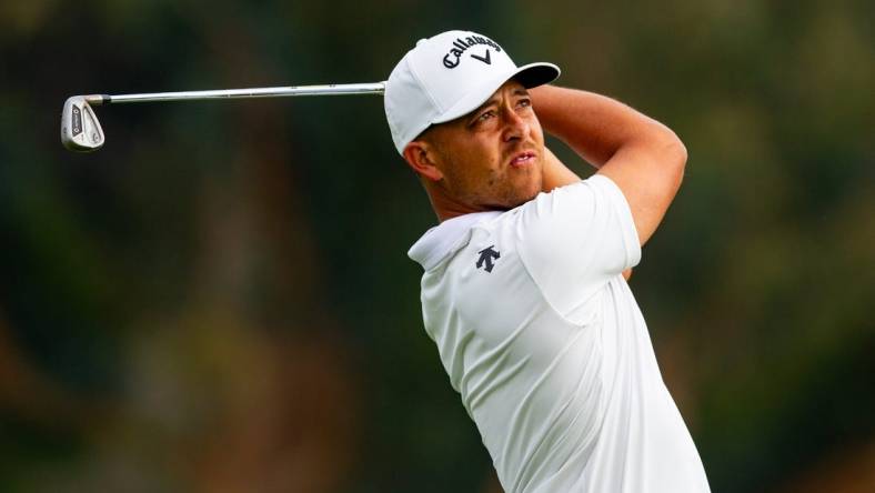 Feb 17, 2024; Pacific Palisades, California, USA; Xander Schauffele plays on the sixteenth hole during the third round of The Genesis Invitational golf tournament at Riviera Country Club. Mandatory Credit: Jason Parkhurst-USA TODAY Sports