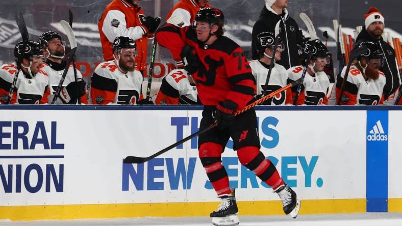 Feb 17, 2024; East Rutherford, New Jersey, USA; New Jersey Devils right wing Tyler Toffoli (73) celebrates his goal against the Philadelphia Flyers during the first period in a Stadium Series ice hockey game at MetLife Stadium. Mandatory Credit: Ed Mulholland-USA TODAY Sports