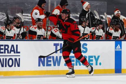 Feb 17, 2024; East Rutherford, New Jersey, USA; New Jersey Devils right wing Tyler Toffoli (73) celebrates his goal against the Philadelphia Flyers during the first period in a Stadium Series ice hockey game at MetLife Stadium. Mandatory Credit: Ed Mulholland-USA TODAY Sports