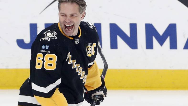 Feb 18, 2024; Pittsburgh, Pennsylvania, USA;  Pittsburgh Penguins former right wing Jaromir Jagr (68) reacts during warm-ups against the Los Angeles Kings at PPG Paints Arena. The Kings won 2-1. Mandatory Credit: Charles LeClaire-USA TODAY Sports