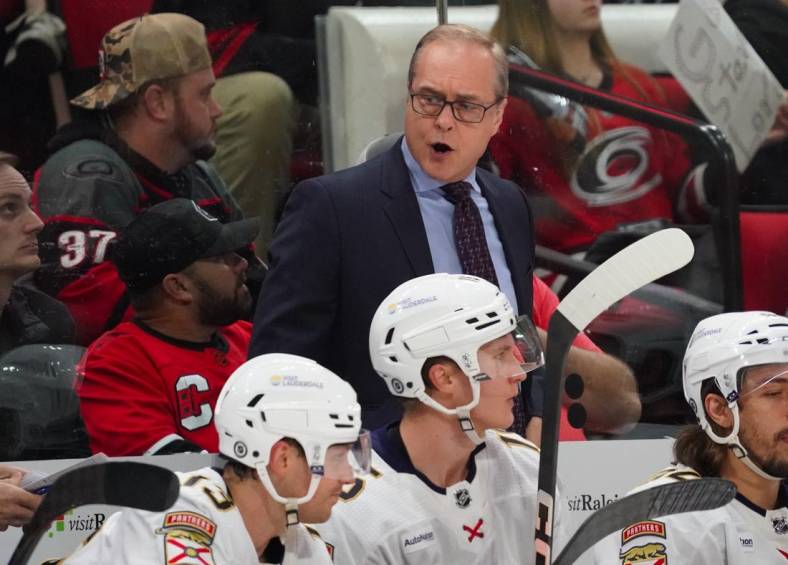 Feb 22, 2024; Raleigh, North Carolina, USA; Florida Panthers head coach Paul Maurice reacts from behind the bench during the second period against the Carolina Hurricanes at PNC Arena. Mandatory Credit: James Guillory-USA TODAY Sports
