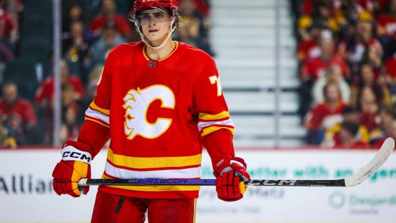 Feb 22, 2024; Calgary, Alberta, CAN; Calgary Flames center Martin Pospisil (76) against the Boston Bruins during the second period at Scotiabank Saddledome. Mandatory Credit: Sergei Belski-USA TODAY Sports