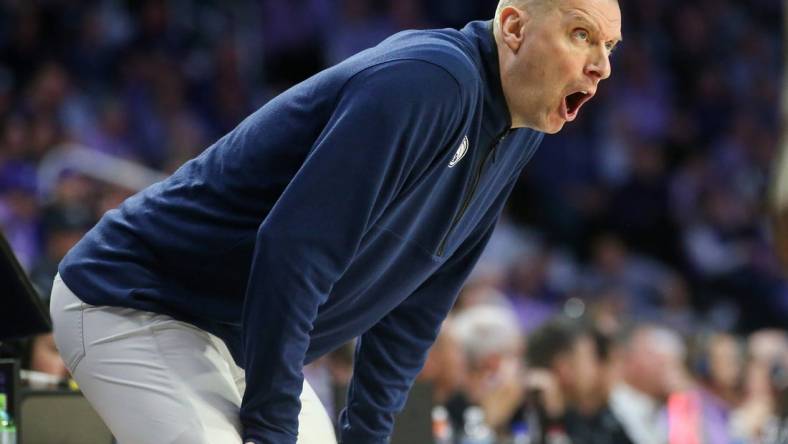 Feb 24, 2024; Manhattan, Kansas, USA; Brigham Young Cougars head coach Mark Pope yells at his team during the first half against the Kansas State Wildcats at Bramlage Coliseum. Mandatory Credit: Scott Sewell-USA TODAY Sports