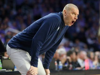 Feb 24, 2024; Manhattan, Kansas, USA; Brigham Young Cougars head coach Mark Pope yells at his team during the first half against the Kansas State Wildcats at Bramlage Coliseum. Mandatory Credit: Scott Sewell-USA TODAY Sports