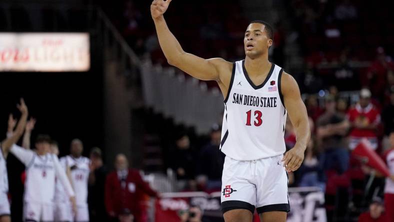 Feb 24, 2024; Fresno, California, USA; San Diego State Aztecs forward Jaedon LeDee (13) reacts after making a three point basket against the Fresno State Bulldogs in the first half at the Save Mart Center. Mandatory Credit: Cary Edmondson-USA TODAY Sports