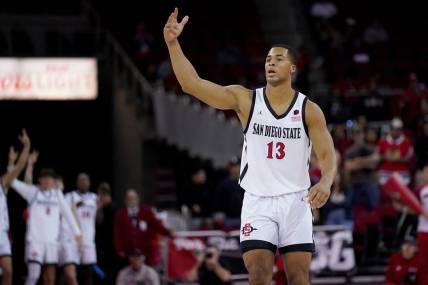Feb 24, 2024; Fresno, California, USA; San Diego State Aztecs forward Jaedon LeDee (13) reacts after making a three point basket against the Fresno State Bulldogs in the first half at the Save Mart Center. Mandatory Credit: Cary Edmondson-USA TODAY Sports