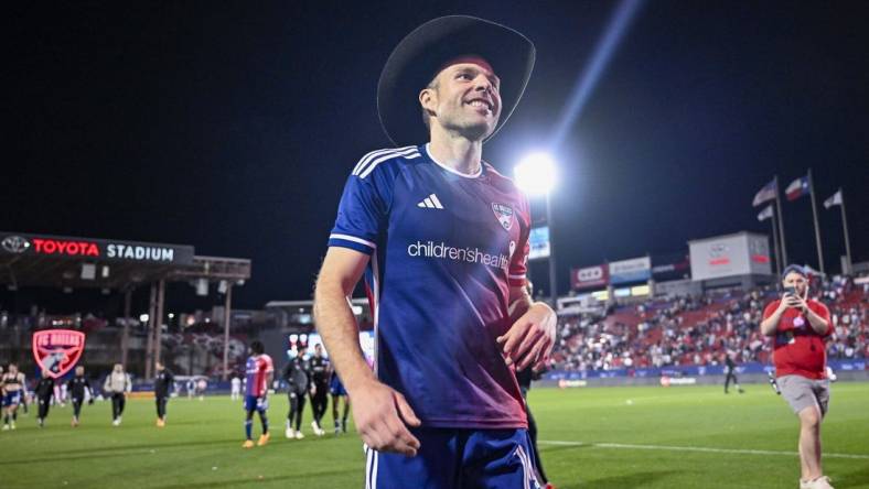 Feb 24, 2024; Frisco, Texas, USA; FC Dallas midfielder Asier Illarramendi (14) celebrates with the cowboy hat after FC Dallas defeats San Jose Earthquakes 2-1 at Toyota Stadium. Mandatory Credit: Jerome Miron-USA TODAY Sports