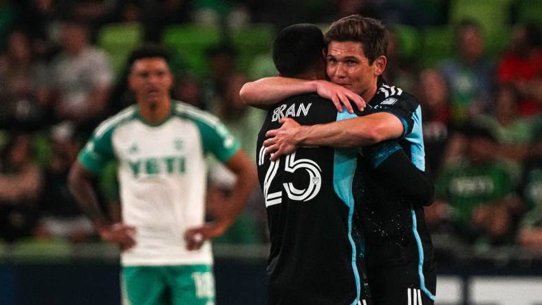 Minnesota United FC midfielders Alejandro Bran (25) and Wil Trapp (20) celebrate as time expires in the match against Austin FC at Q2 stadium on Feb. 24, 2024 in Austin. Minnesota defeated Austin 2-1.