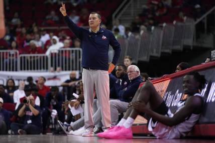 Feb 24, 2024; Fresno, California, USA; Fresno State Bulldogs head coach Justin Hutson calls a play against the San Diego State Aztecs in the second half at the Save Mart Center. Mandatory Credit: Cary Edmondson-USA TODAY Sports