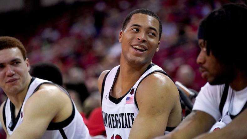 Feb 24, 2024; Fresno, California, USA; San Diego State Aztecs forward Jaedon LeDee (13) smiles on the team bench during action against the Fresno State Bulldogs in the second half at the Save Mart Center. Mandatory Credit: Cary Edmondson-USA TODAY Sports