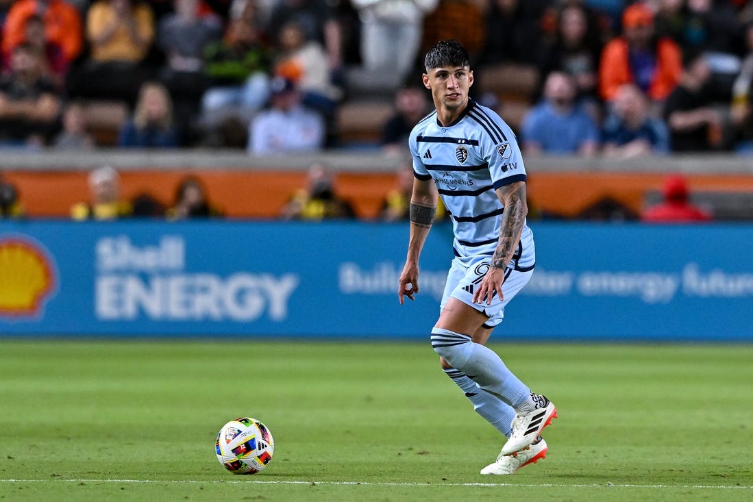 Feb 24, 2024; Houston, Texas, USA; Sporting Kansas City forward Alan Pulido (9) controls the ball during the first half against Houston Dynamo FC at Shell Energy Stadium. Mandatory Credit: Maria Lysaker-USA TODAY Sports