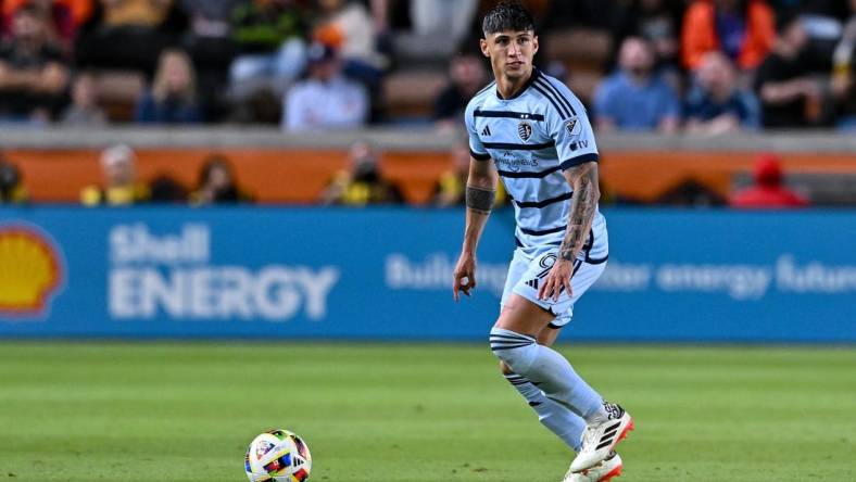 Feb 24, 2024; Houston, Texas, USA; Sporting Kansas City forward Alan Pulido (9) controls the ball during the first half against Houston Dynamo FC at Shell Energy Stadium. Mandatory Credit: Maria Lysaker-USA TODAY Sports