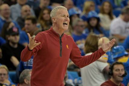 Feb 24, 2024; Los Angeles, California, USA;  USC Trojans head coach Andy Enfield yells from the bench in the second half against the UCLA Bruins at Pauley Pavilion presented by Wescom. Mandatory Credit: Jayne Kamin-Oncea-USA TODAY Sports