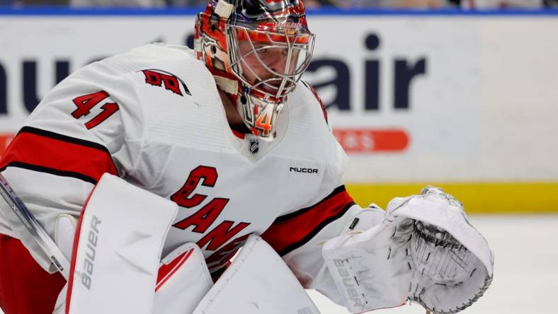 Feb 25, 2024; Buffalo, New York, USA;  Carolina Hurricanes goaltender Spencer Martin (41) looks to make a save during the second period against the Buffalo Sabres at KeyBank Center. Mandatory Credit: Timothy T. Ludwig-USA TODAY Sports