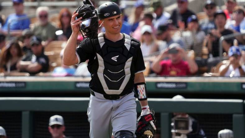 Feb 27, 2024; Phoenix, Arizona, USA; Chicago White Sox catcher Max Stassi (33) looks on against the Los Angeles Dodgers during the first inning at Camelback Ranch-Glendale. Mandatory Credit: Joe Camporeale-USA TODAY Sports