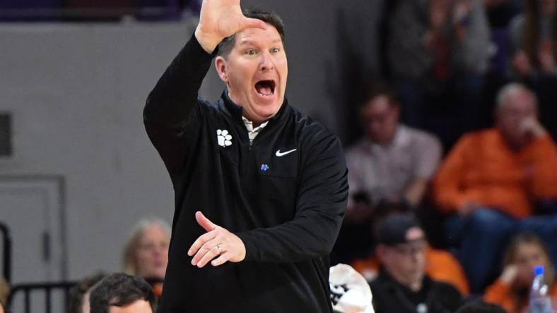 Feb 27, 2024; Clemson, South Carolina, USA;  Clemson Head Coach Brad Brownell communicates in the game with Pitt during the first half at Littlejohn Coliseum. Mandatory Credit: Ken Ruinard-USA TODAY Sports