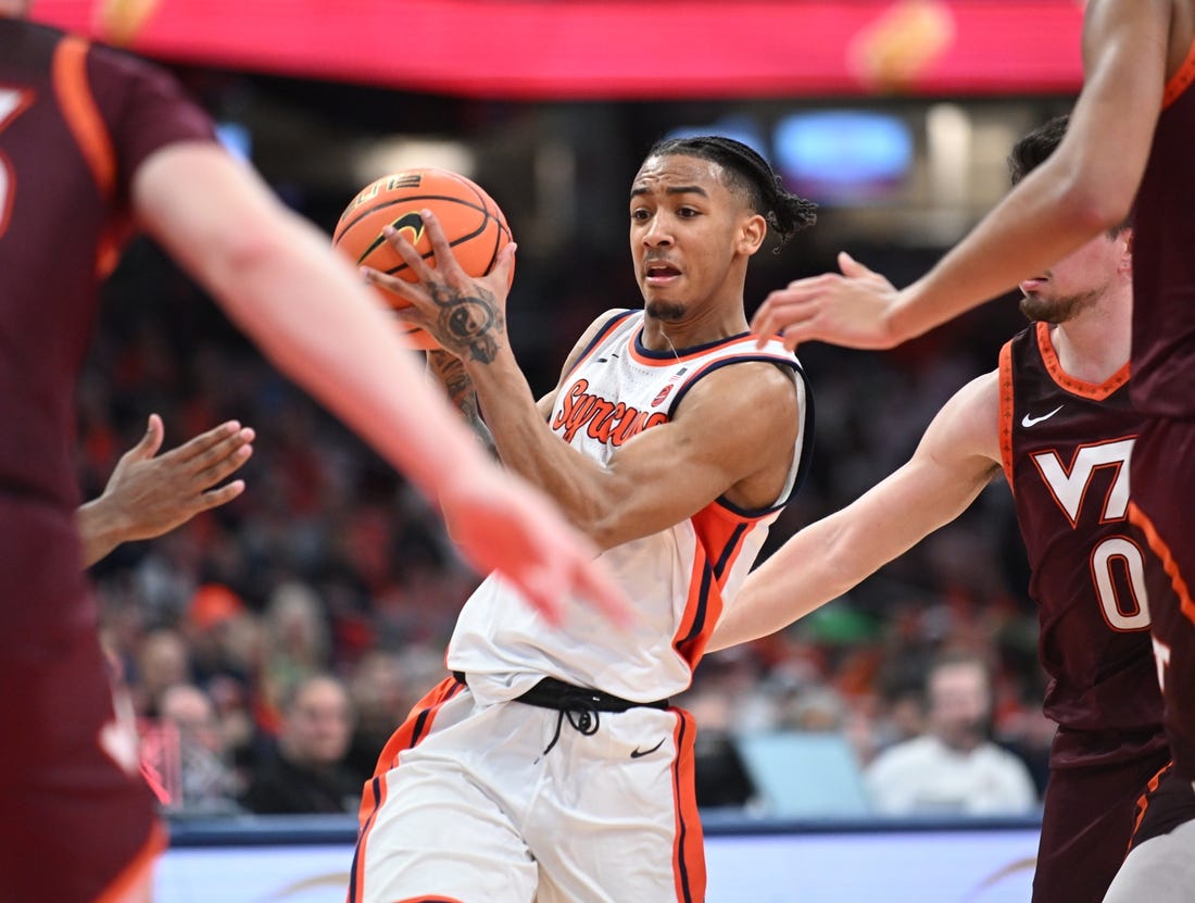 Feb 27, 2024; Syracuse, New York, USA; Syracuse Orange guard Judah Mintz handles the ball in traffic against the Virginia Tech Hokies in the second half at the JMA Wireless Dome. Mandatory Credit: Mark Konezny-USA TODAY Sports