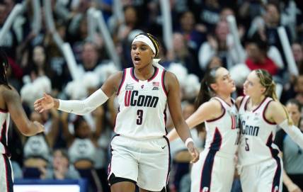 Feb 28, 2024; Storrs, Connecticut, USA; UConn Huskies forward Aaliyah Edwards (3) and teammates react during a timeout against the Villanova Wildcats in the second half at Harry A. Gampel Pavilion. Mandatory Credit: David Butler II-USA TODAY Sports