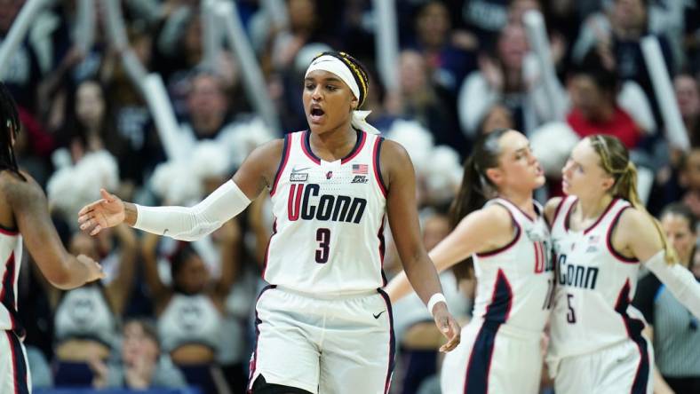 Feb 28, 2024; Storrs, Connecticut, USA; UConn Huskies forward Aaliyah Edwards (3) and teammates react during a timeout against the Villanova Wildcats in the second half at Harry A. Gampel Pavilion. Mandatory Credit: David Butler II-USA TODAY Sports