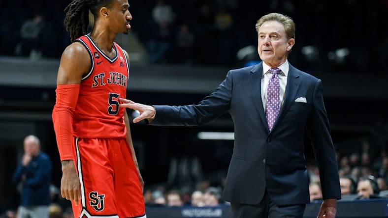 Feb 28, 2024; Indianapolis, Indiana, USA;  St. John's Red Storm guard Daniss Jenkins (5) talks with St. John's Red Storm head coach Rick Pitino during the second half at Hinkle Fieldhouse. Mandatory Credit: Robert Goddin-USA TODAY Sports