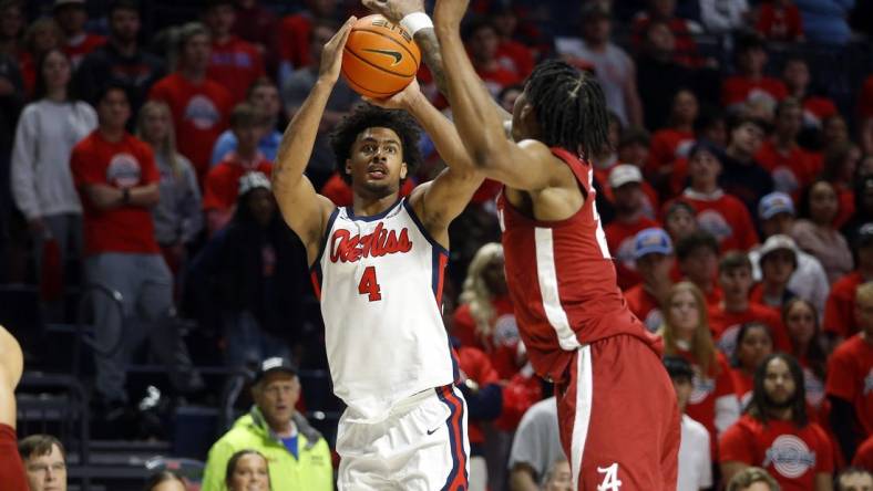 Feb 28, 2024; Oxford, Mississippi, USA; Mississippi Rebels forward Jaemyn Brakefield (4) shoots for three during the second half against the Alabama Crimson Tide at The Sandy and John Black Pavilion at Ole Miss. Mandatory Credit: Petre Thomas-USA TODAY Sports