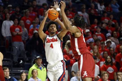 Feb 28, 2024; Oxford, Mississippi, USA; Mississippi Rebels forward Jaemyn Brakefield (4) shoots for three during the second half against the Alabama Crimson Tide at The Sandy and John Black Pavilion at Ole Miss. Mandatory Credit: Petre Thomas-USA TODAY Sports