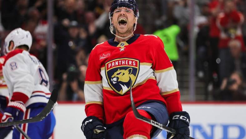 Feb 29, 2024; Sunrise, Florida, USA; Florida Panthers center Sam Reinhart (13) reacts after scoring against the Montreal Canadiens during the second period at Amerant Bank Arena. Mandatory Credit: Sam Navarro-USA TODAY Sports