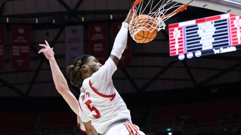 Feb 29, 2024; Salt Lake City, Utah, USA; Utah Utes guard Deivon Smith (5) dunks the ball against the Stanford Cardinal during the second half at Jon M. Huntsman Center. Mandatory Credit: Rob Gray-USA TODAY Sports