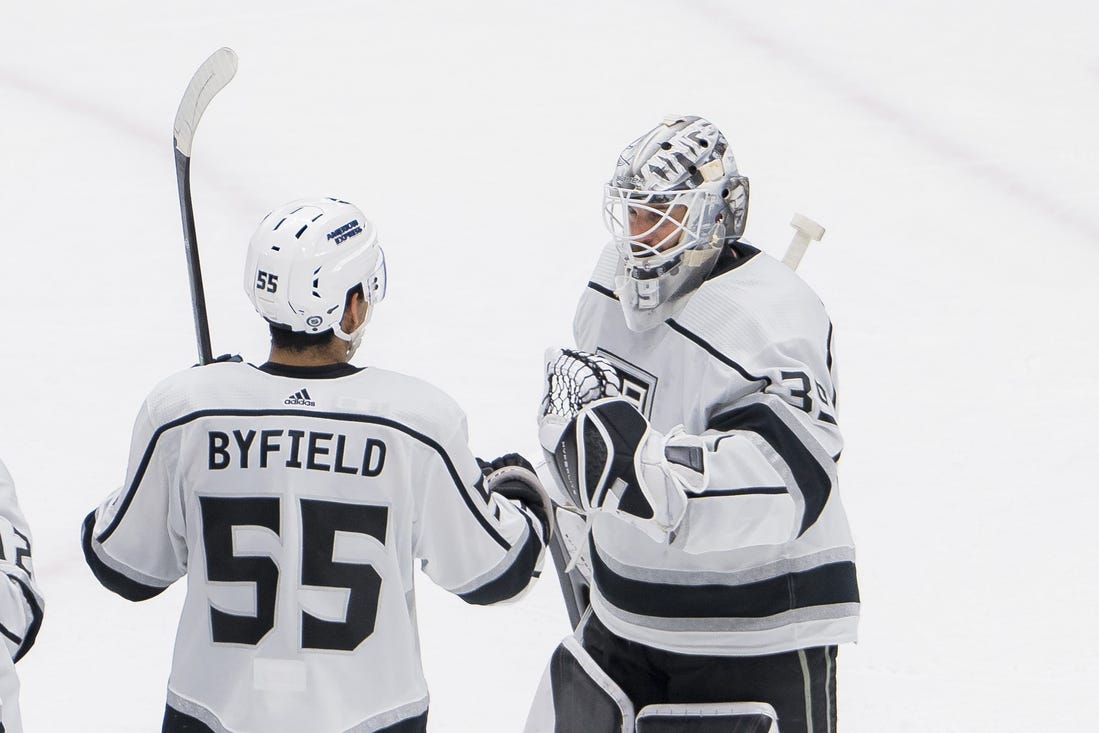 Feb 29, 2024; Vancouver, British Columbia, CAN; Los Angeles Kings forward Quinton Byfield (55) and goalie Cam Talbot (39) celebrate thier victory against the Vancouver Canucks at Rogers Arena. Kings won 5-1. Mandatory Credit: Bob Frid-USA TODAY Sports