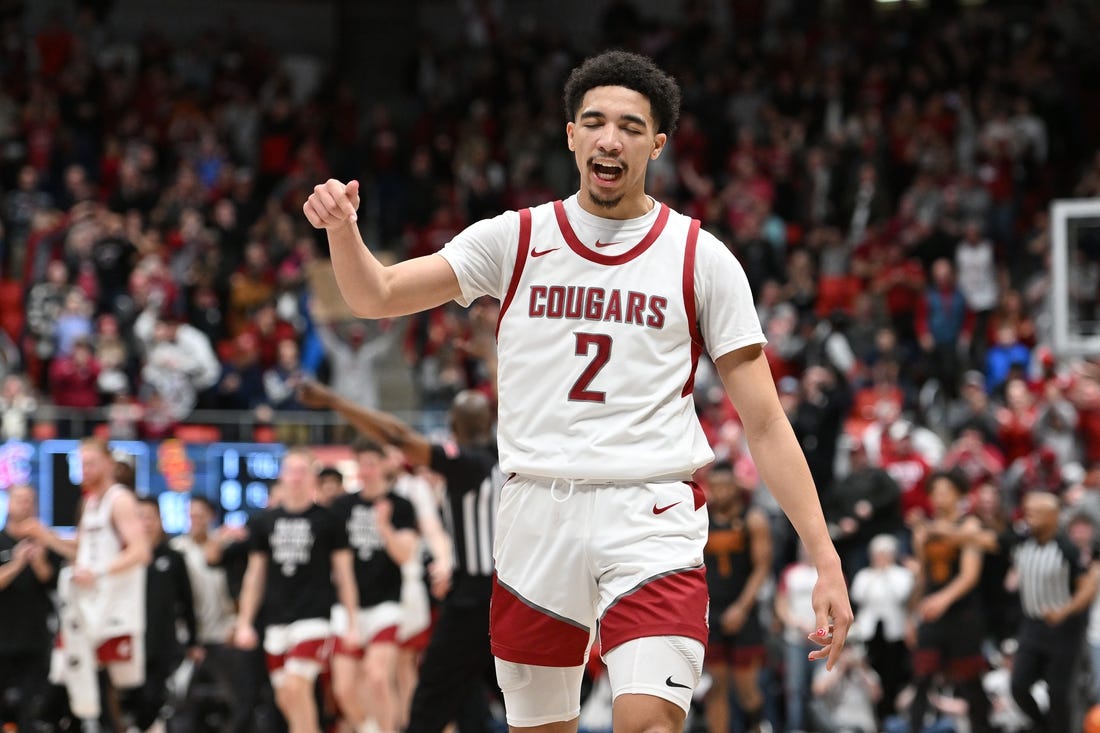 Feb 29, 2024; Pullman, Washington, USA; Washington State Cougars guard Myles Rice (2) celebrates during a time out during a game against the USC Trojans in the second half at Friel Court at Beasley Coliseum. Washington State Cougars won 75-72. Mandatory Credit: James Snook-USA TODAY Sports