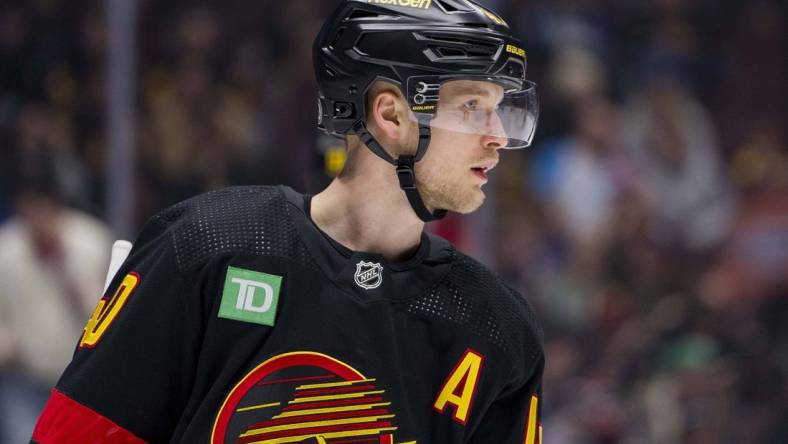 Feb 29, 2024; Vancouver, British Columbia, CAN; Vancouver Canucks forward Elias Pettersson (40) during a stop in play against the Los Angeles Kings in the first period at Rogers Arena. Mandatory Credit: Bob Frid-USA TODAY Sports