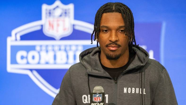 Mar 1, 2024; Indianapolis, IN, USA; Louisiana State quarterback Jayden Daniels (QB01) talks to the media during the 2024 NFL Combine at Lucas Oil Stadium. Mandatory Credit: Trevor Ruszkowski-USA TODAY Sports