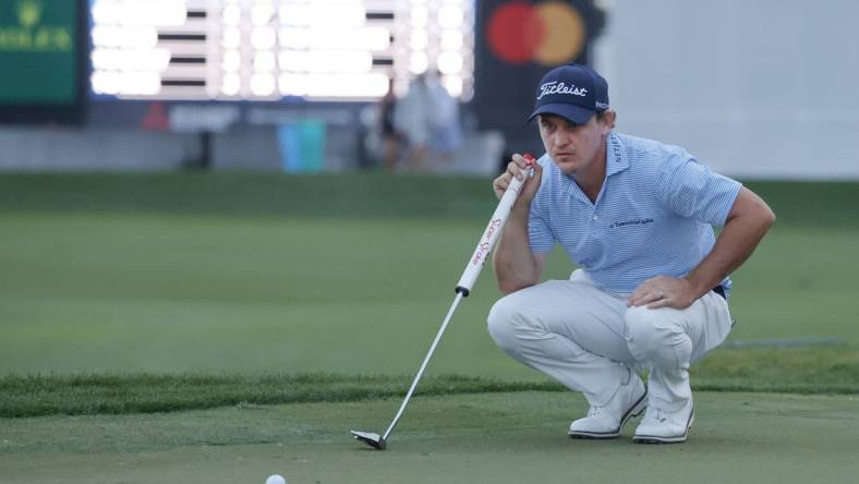 Mar 1, 2024; Palm Beach Gardens, Florida, USA; Bud Cauley lines up his putt on the 18th green during the second round of the Cognizant Classic in The Palm Beaches golf tournament. Mandatory Credit: Reinhold Matay-USA TODAY Sports