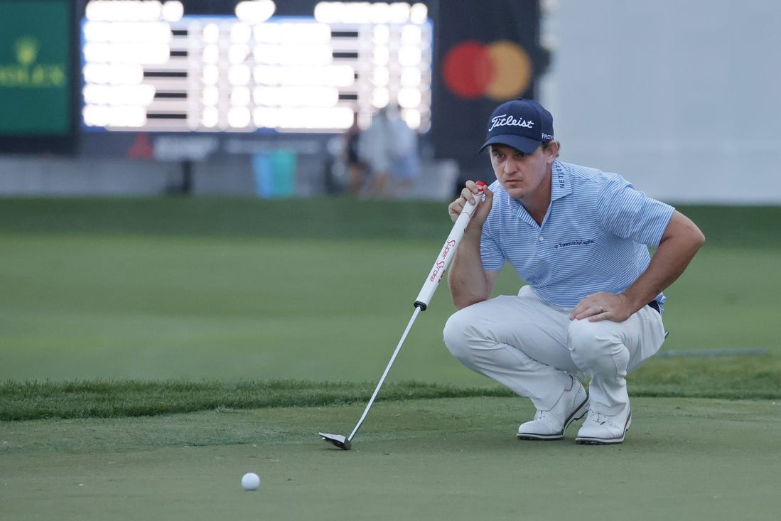 Mar 1, 2024; Palm Beach Gardens, Florida, USA; Bud Cauley lines up his putt on the 18th green during the second round of the Cognizant Classic in The Palm Beaches golf tournament. Mandatory Credit: Reinhold Matay-USA TODAY Sports