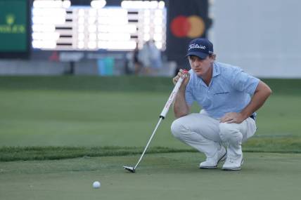 Mar 1, 2024; Palm Beach Gardens, Florida, USA; Bud Cauley lines up his putt on the 18th green during the second round of the Cognizant Classic in The Palm Beaches golf tournament. Mandatory Credit: Reinhold Matay-USA TODAY Sports