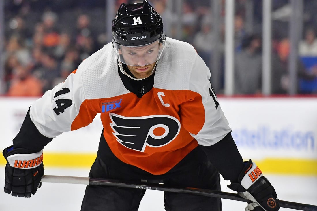 Feb 27, 2024; Philadelphia, Pennsylvania, USA; Philadelphia Flyers center Sean Couturier (14) against the Tampa Bay Lightning at Wells Fargo Center. Mandatory Credit: Eric Hartline-USA TODAY Sports