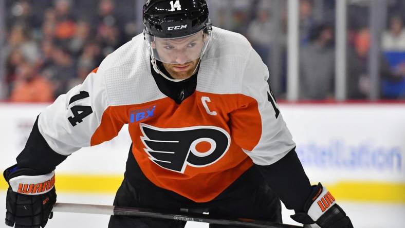 Feb 27, 2024; Philadelphia, Pennsylvania, USA; Philadelphia Flyers center Sean Couturier (14) against the Tampa Bay Lightning at Wells Fargo Center. Mandatory Credit: Eric Hartline-USA TODAY Sports