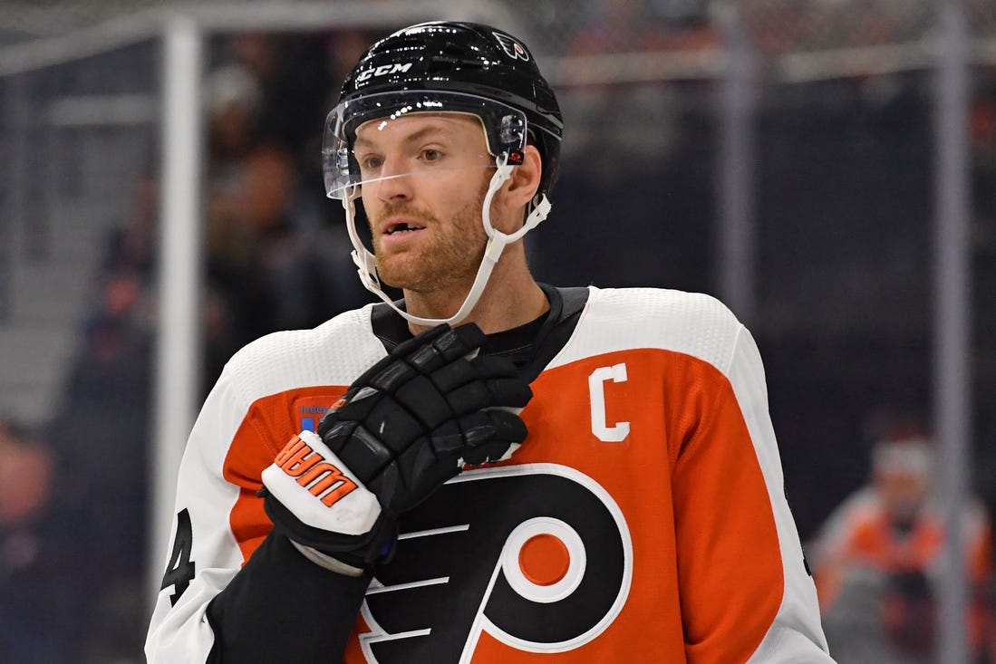 Feb 27, 2024; Philadelphia, Pennsylvania, USA; Philadelphia Flyers center Sean Couturier (14) against the Tampa Bay Lightning at Wells Fargo Center. Mandatory Credit: Eric Hartline-USA TODAY Sports