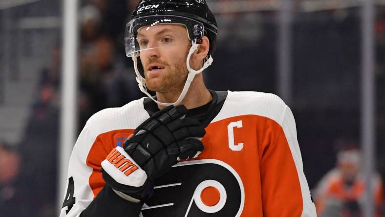 Feb 27, 2024; Philadelphia, Pennsylvania, USA; Philadelphia Flyers center Sean Couturier (14) against the Tampa Bay Lightning at Wells Fargo Center. Mandatory Credit: Eric Hartline-USA TODAY Sports