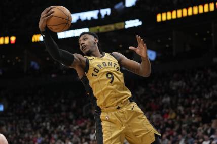 Mar 1, 2024; Toronto, Ontario, CAN; Toronto Raptors guard RJ Barrett (9) comes down with a rebound against Golden State Warriors during the second half at Scotiabank Arena. Mandatory Credit: John E. Sokolowski-USA TODAY Sports