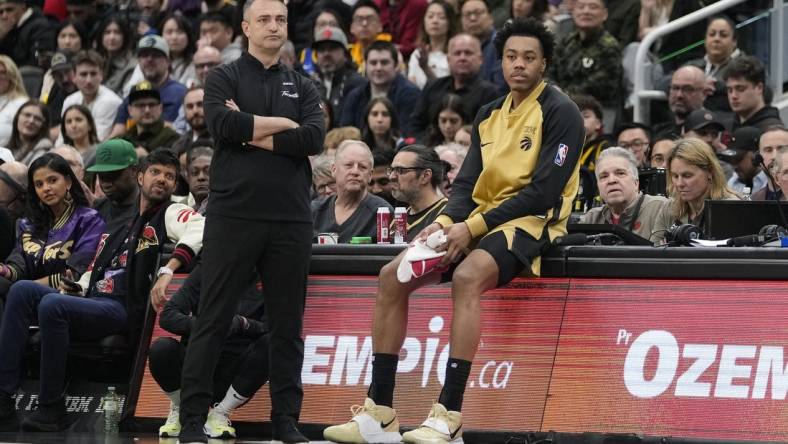 Mar 1, 2024; Toronto, Ontario, CAN; Toronto Raptors head coach Darko Rajakovic and forward Scottie Barnes (4) wait for a stoppage in play against the Golden State Warriors during the first half at Scotiabank Arena. Mandatory Credit: John E. Sokolowski-USA TODAY Sports