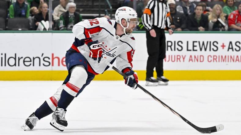 Jan 27, 2024; Dallas, Texas, USA; Washington Capitals center Evgeny Kuznetsov (92) in action during the game between the Dallas Stars and the Washington Capitals at the American Airlines Center. Mandatory Credit: Jerome Miron-USA TODAY Sports