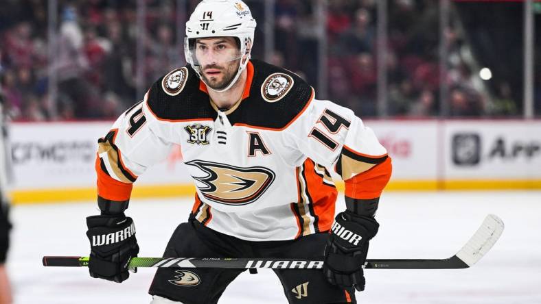 Feb 13, 2024; Montreal, Quebec, CAN; Anaheim Ducks center Adam Henrique (14) waits for a face-off against the Montreal Canadiens during the first period at Bell Centre. Mandatory Credit: David Kirouac-USA TODAY Sports