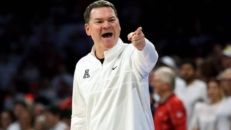 Mar 2, 2024; Tucson, Arizona, USA; Arizona Wildcats head coach Tommy Lloyd on the sidelines against the Oregon Ducks during the first half at McKale Center. Mandatory Credit: Zachary BonDurant-USA TODAY Sports