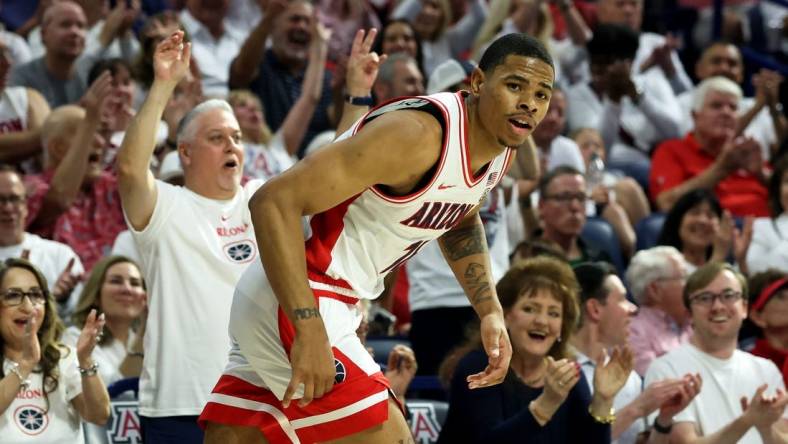 Mar 2, 2024; Tucson, Arizona, USA; Arizona Wildcats forward Keshad Johnson (16) makes a 3-point basket against the Oregon Ducks during the second half at McKale Center. Mandatory Credit: Zachary BonDurant-USA TODAY Sports