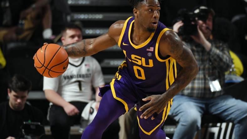 Mar 2, 2024; Nashville, Tennessee, USA; LSU Tigers guard Trae Hannibal (0) moves the ball up the floor after a rebound during the second half against the Vanderbilt Commodores at Memorial Gymnasium. Mandatory Credit: Christopher Hanewinckel-USA TODAY Sports