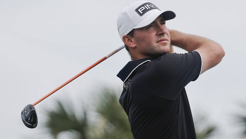 Mar 2, 2024; Palm Beach Gardens, Florida, USA; Austin Eckroat plays his shot from the fourth tee during the third round of the Cognizant Classic in The Palm Beaches golf tournament. Mandatory Credit: Reinhold Matay-USA TODAY Sports