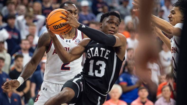 Mississippi State Bulldogs guard Josh Hubbard (13) drives the ball as Auburn Tigers take on Mississippi State Bulldogs at Neville Arena in Auburn, Ala., on Saturday, March 2, 2024. Auburn Tigers lead Mississippi State Bulldogs 39-22 at halftime.