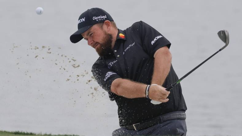 Mar 2, 2024; Palm Beach Gardens, Florida, USA;  Shane Lowry hits from the bunker onto the 18th green during the third round of the Cognizant Classic in The Palm Beaches golf tournament. Mandatory Credit: Reinhold Matay-USA TODAY Sports